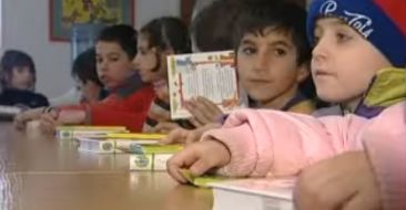 Holy Bibles to the children of Sos village